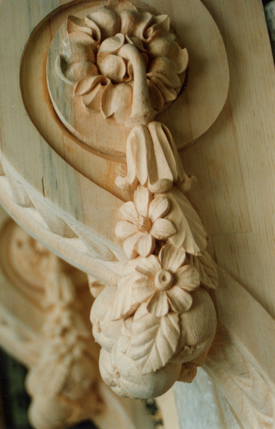 Close up detail of flowers and boss - wood carving table flowers boss hampton court palace